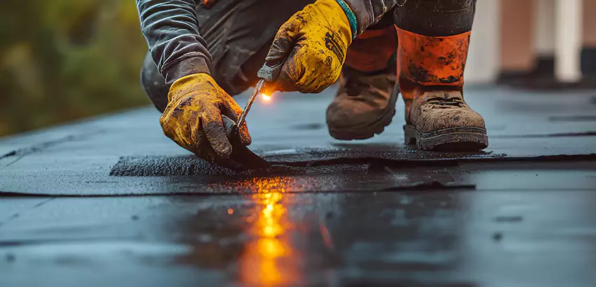EPDM Roof Repair Tape Application in Harrison